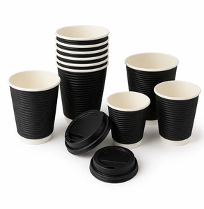 Wholesale black and maroon double wall ripple paper coffee cups with lids on a white wooden background