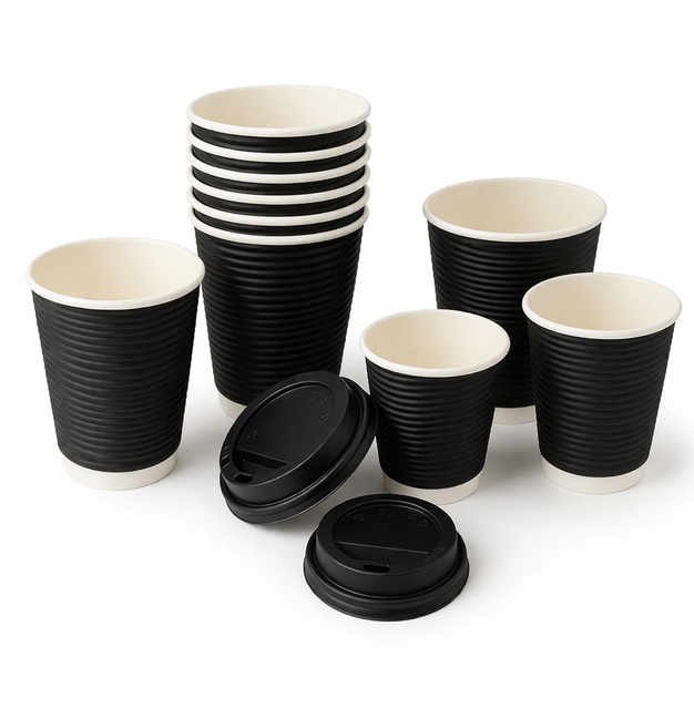 Wholesale black and maroon double wall ripple paper coffee cups with lids on a white wooden background